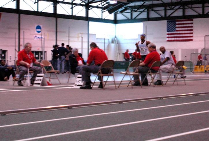 Fred Jones makes his way down the   triple jump runway.