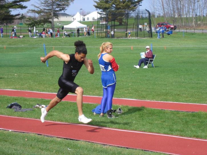 Nate Scott heads down the runway in the Long Jump