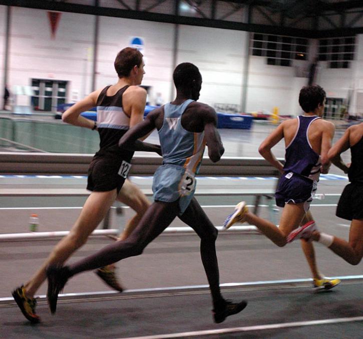 Nate Brigham and eventual winner Macharia Yuot of Widener run together in the 5000.