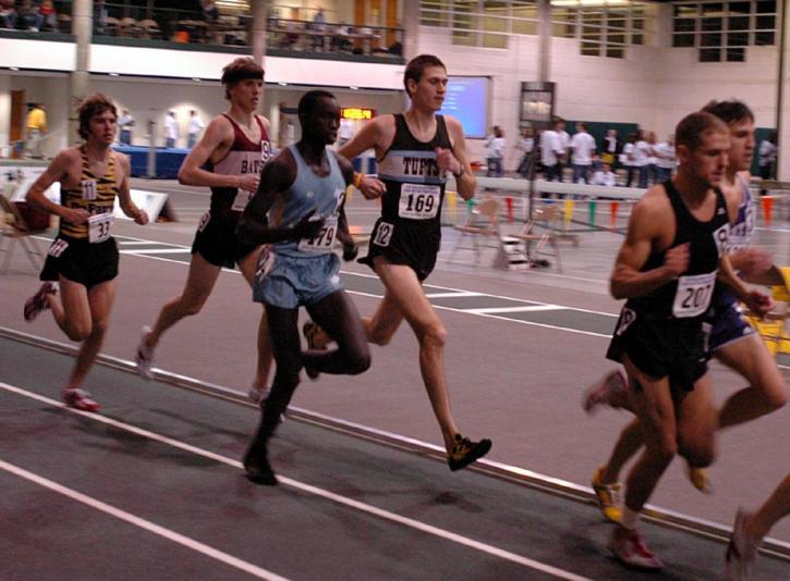 Nate Brigham runs in the pack early in the 5000.