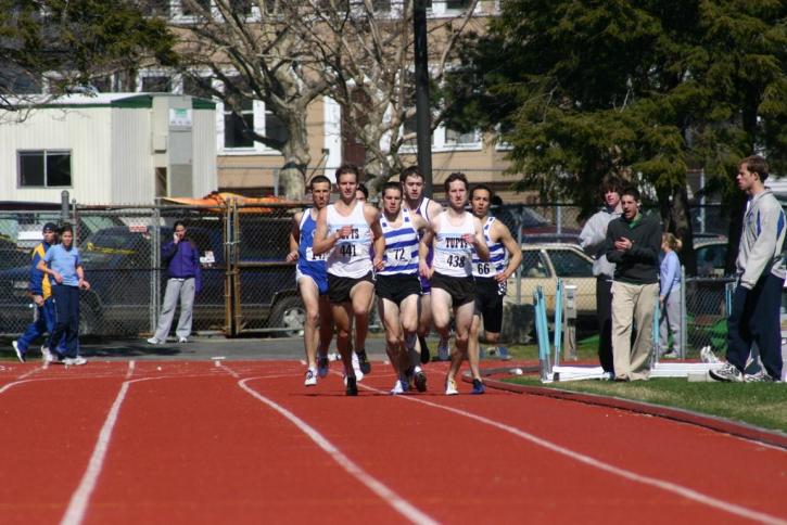 Scott Merrick cheers on Brian McNamara and Pat Mahoney in the 800.