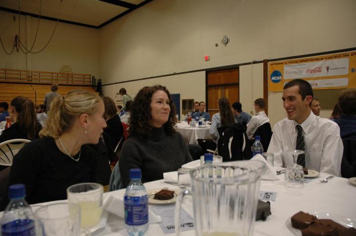 Josh Kennedy talking with Coach Morwick and Becca