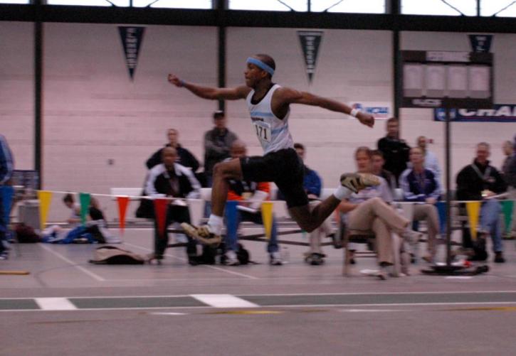 Fred Jones shows off his form in the triple jump prelims.