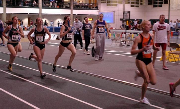 Katy O'Brien runs the 1200 leg for the Jumbos in the DMR.