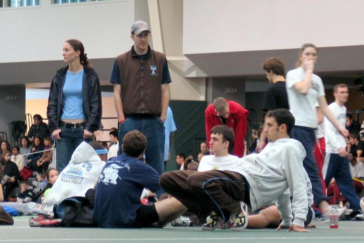 Adam Carberry talks to athletes as the meet kicks off