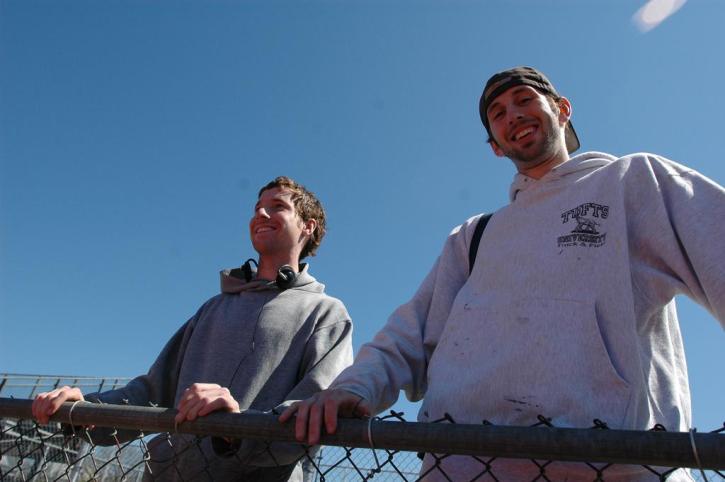 Pat Mahoney and Ethan Barron watch the meet