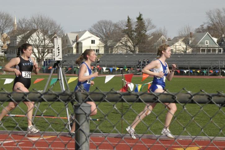 Julia Godberg chases a couple runners from Mount Holyoke in the 10k.