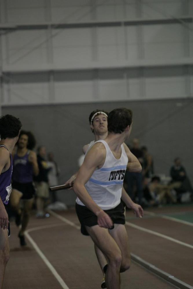 Brian McNamara gets ready to take the hand-off from Pat Mahoney