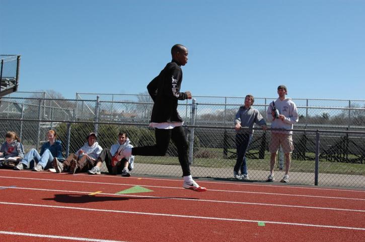 Fred Jones warms up for the Long jump