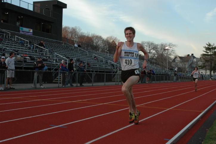 Nate Brigham charges down the final straightaway in the 5000.