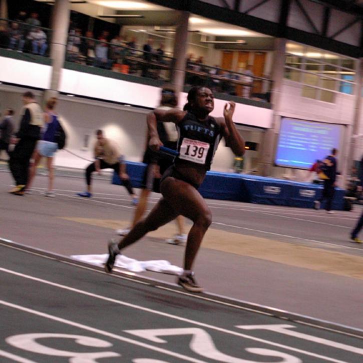 Claudia Clarke finishes up her leg of the 4x400.