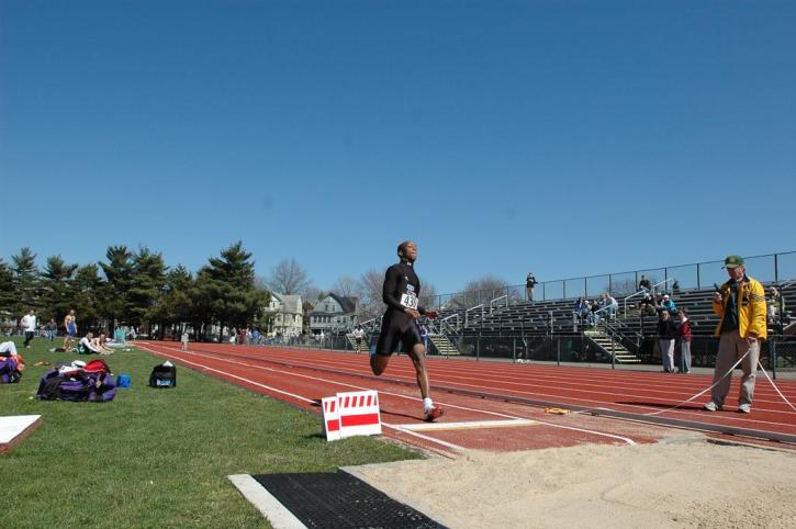 Fred Jones prepares for takeoff in the long jump