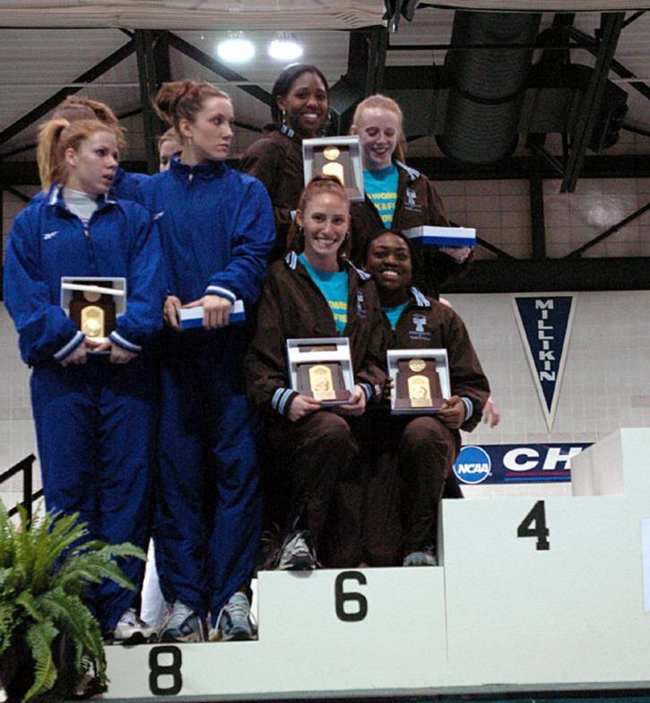 Claudia Clarke, Rachel Bloom, Kaleigh Fitzpatrick and Jillian Warner pose on the podium as All-Americans in the 4x400.