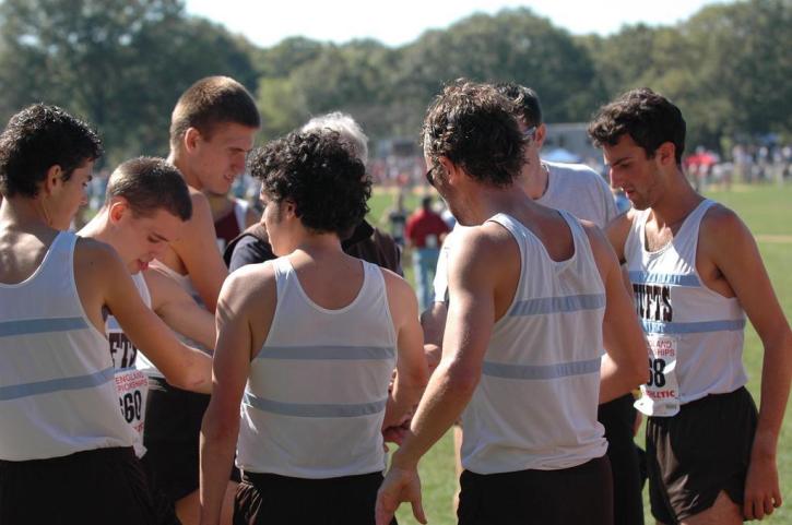 Tufts top 7 huddle up before the All New England race