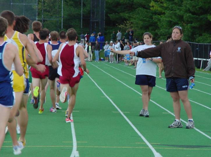 gluckman handing out water