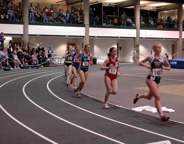 Catherine Beck runs with the main pack in the 5000.