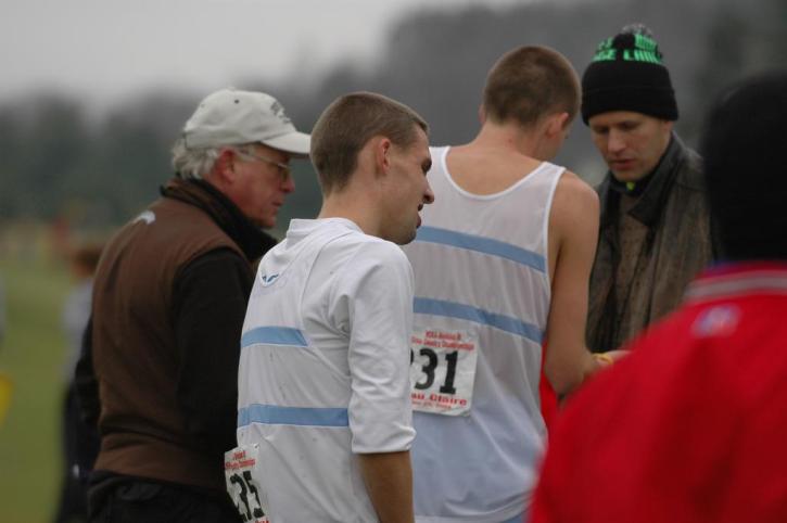 Nate Brigham talking with his dad and Matt Fortin looking a little tired