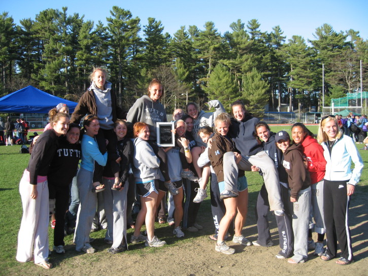 Women's Team poses with their plaque