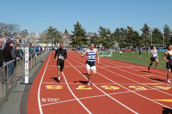 Fred Jones finishes the 100 meter dash