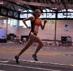 Missy Buttry of Wartburg runs away from the field in the 1500