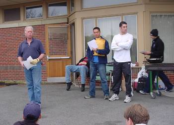 coach putnam handing out awards