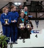 Claudia Clarke, Rachel Bloom, Kaleigh Fitzpatrick and Jillian Warner pose on the podium as All-Americans in the 4x400.