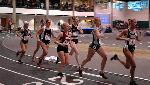 Catherine Beck runs in the pack in the 5000.