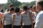 Coach Putnam gives his words to Tufts runners at All New Englands